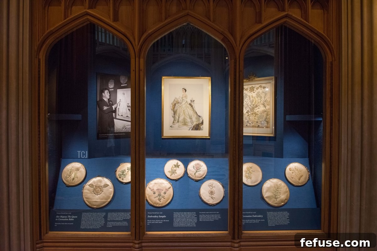 Exhibition of original embroidery samples for Queen Elizabeth II's Coronation dress and a watercolor design, displayed at Windsor Castle in 2022, highlighting the intricate details of Sir Norman Hartnell's work. (Nicky J Sims/Getty Images)