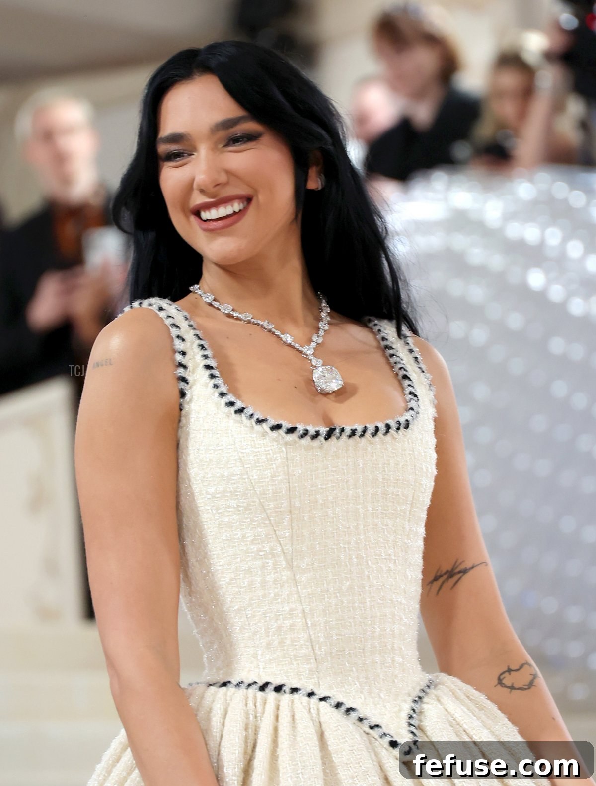 Close-up of Dua Lipa, co-host of the Met Gala 2023, showcasing the breathtaking Tiffany Legendary Diamond necklace.