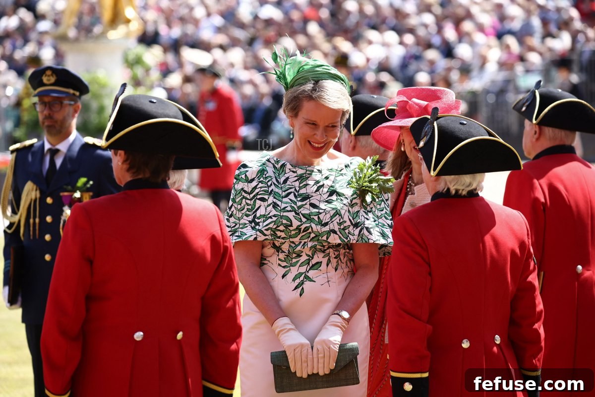 Queen Mathilde of the Belgians attends the annual Founder's Day Parade at the Royal Hospital Chelsea in London on June 8, 2023, radiating royal elegance. (HENRY NICHOLLS/AFP via Getty Images)
