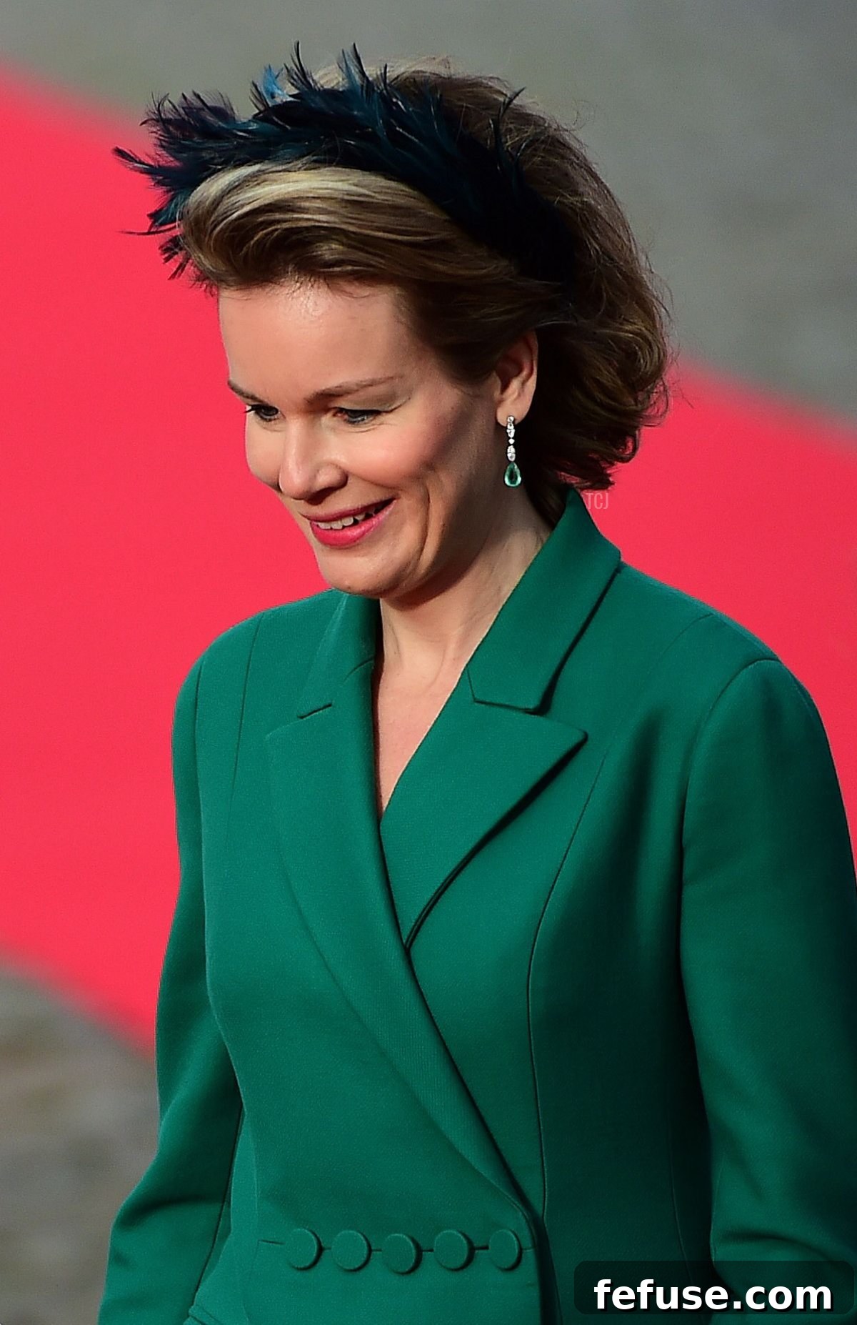 Queen Mathilde with King Felipe VI and Queen Letizia of Spain, wearing her emerald earrings in November 2014. (EMMANUEL DUNAND/AFP via Getty Images)