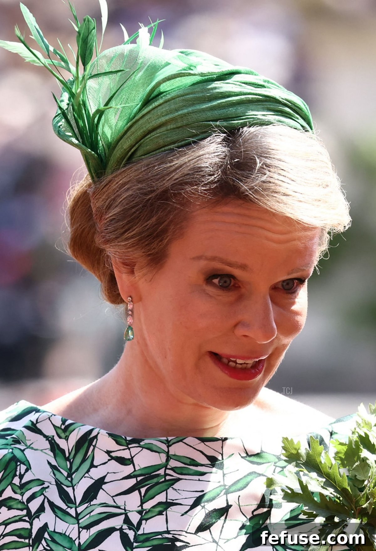 A final detailed view of Queen Mathilde's emerald earrings during the Founder's Day Parade in London, June 2023. (HENRY NICHOLLS/AFP via Getty Images)
