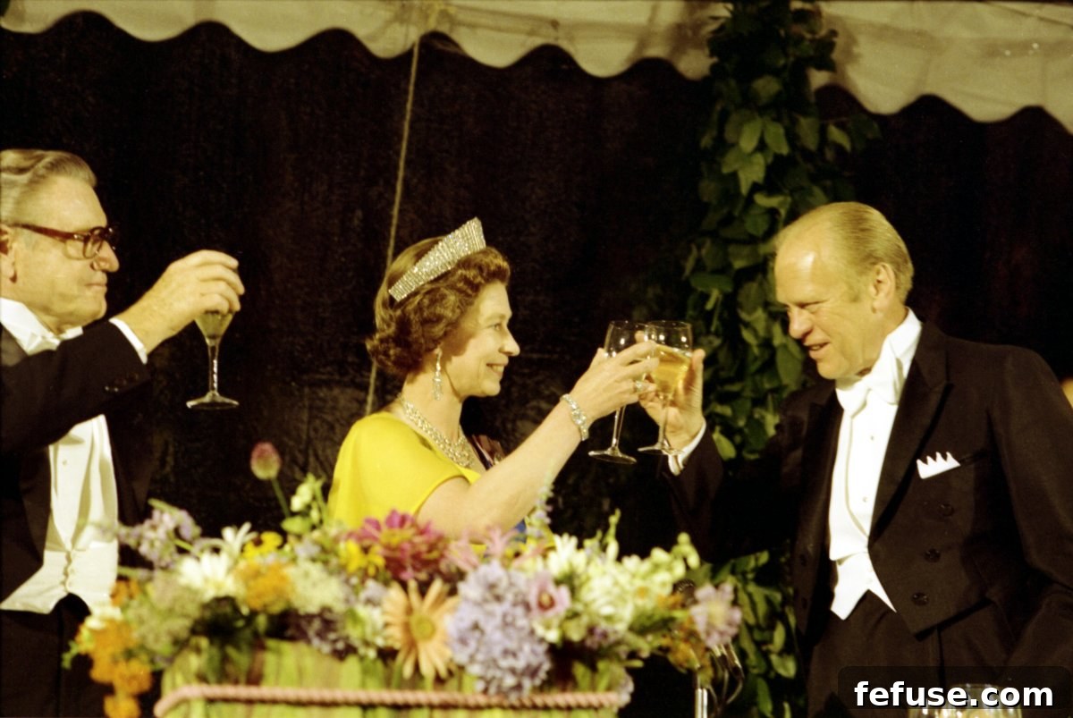 Vice President Nelson Rockefeller, Queen Elizabeth II, and President Gerald Ford toast during a state dinner at the White House in Washington, D.C., July 7, 1976