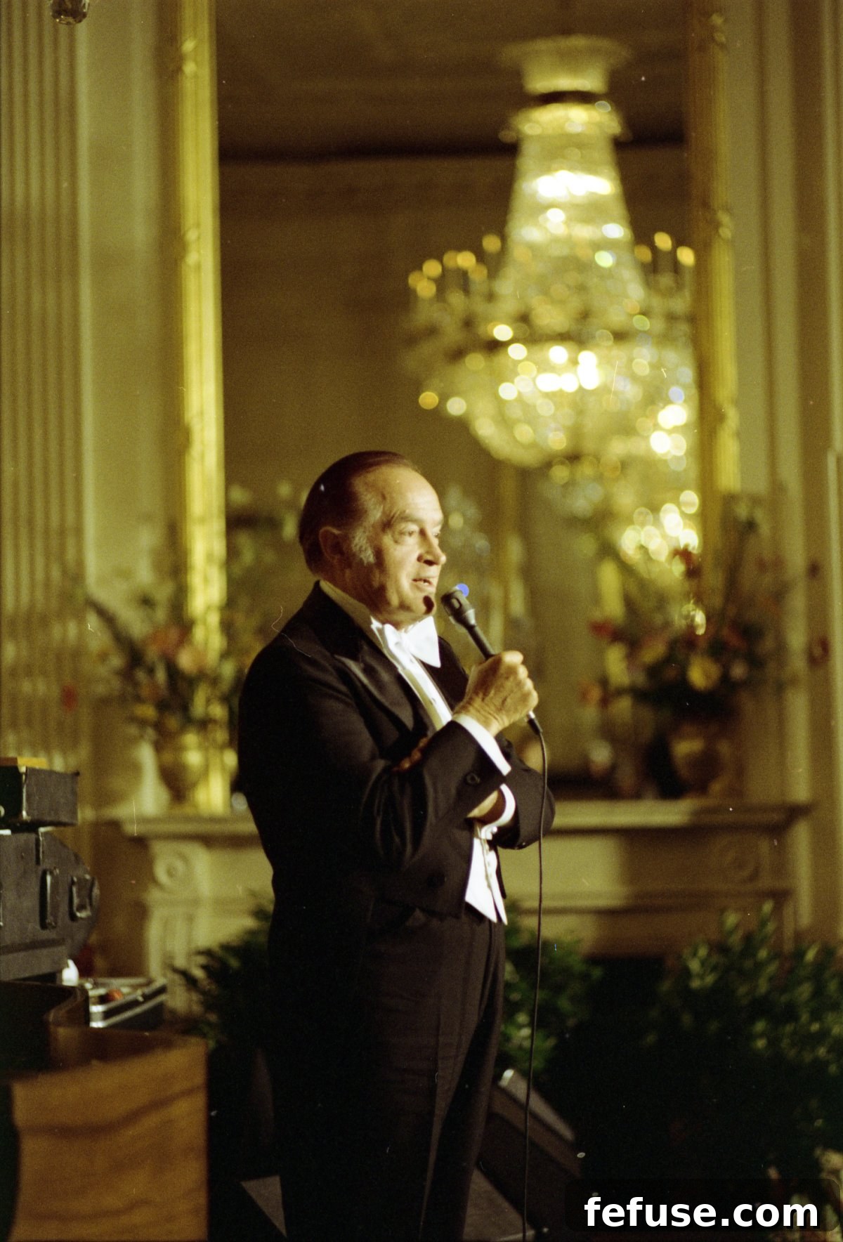 Bob Hope entertains guests after a state dinner at the White House in Washington, D.C., July 7, 1976
