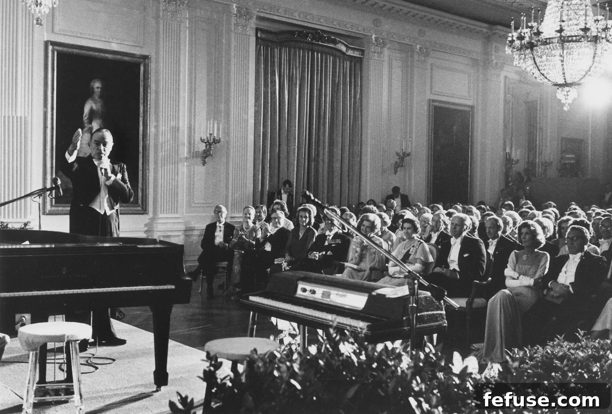 Bob Hope entertains guests after a state dinner at the White House in Washington, D.C., July 7, 1976