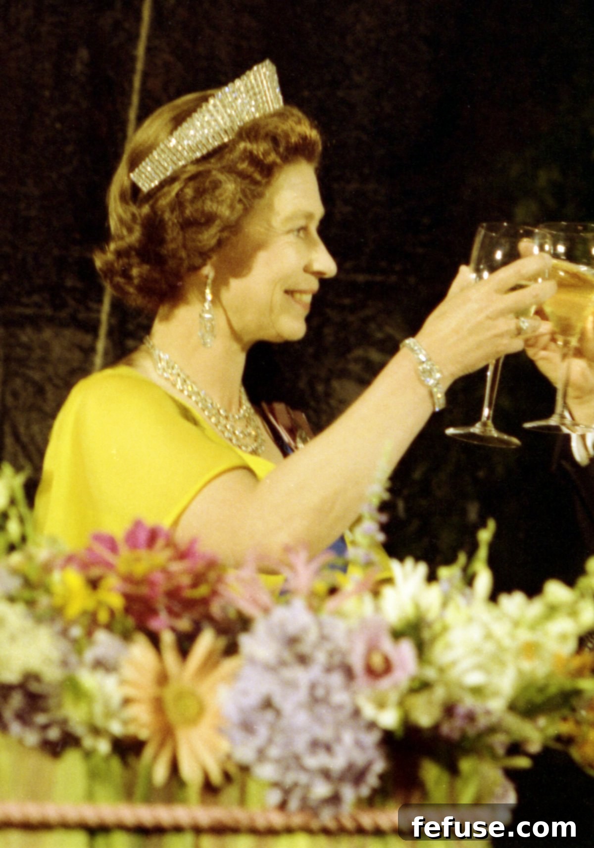 Queen Elizabeth II attends a state dinner at the White House in Washington, D.C., July 7, 1976