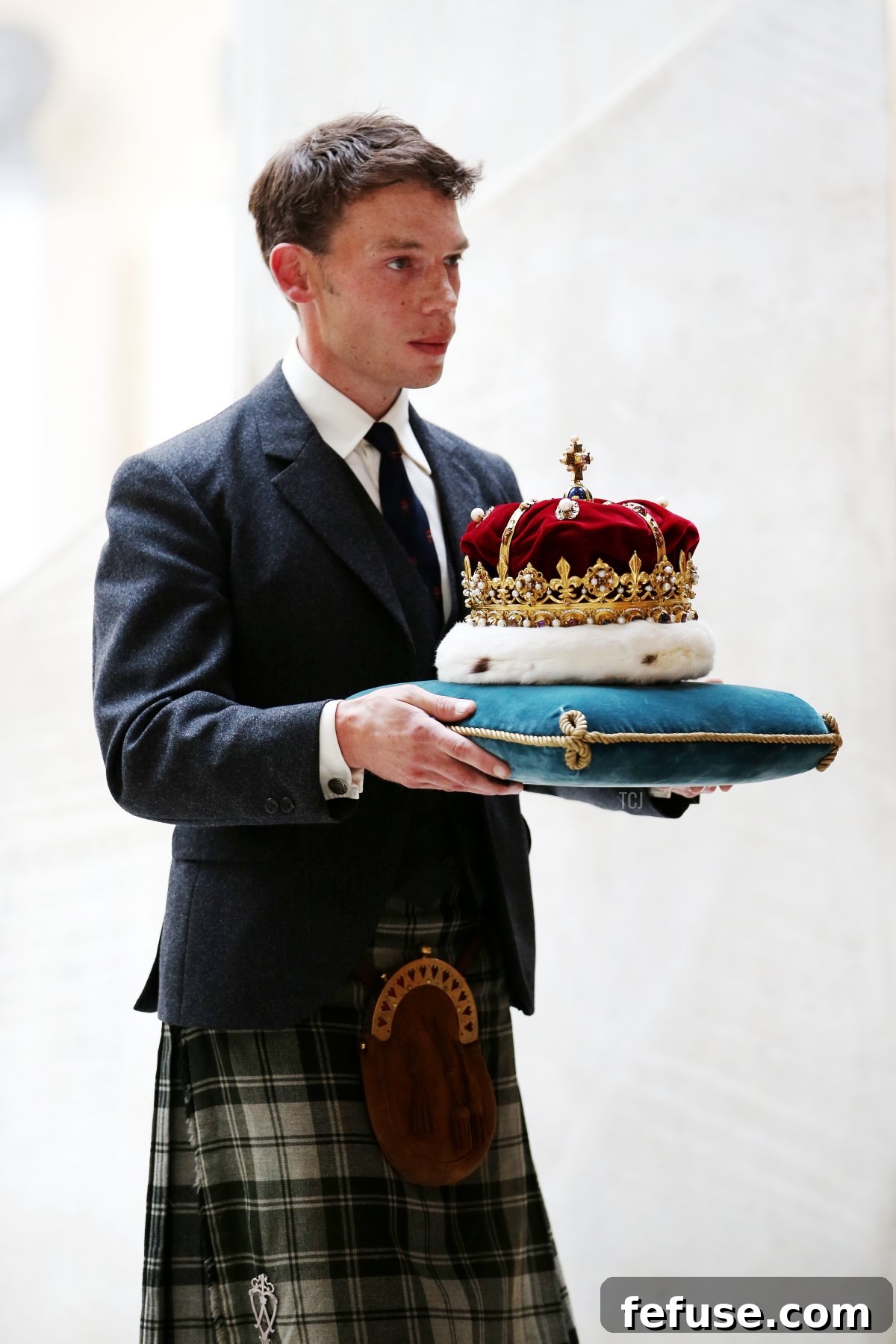 The Duke of Hamilton carries the Crown of Scotland through the Garden Lobby ahead of the opening of the fifth session of the Scottish Parliament on July 2, 2016 in Edinburgh, United Kingdom (Jane Barlow - WPA Pool/Getty Images)