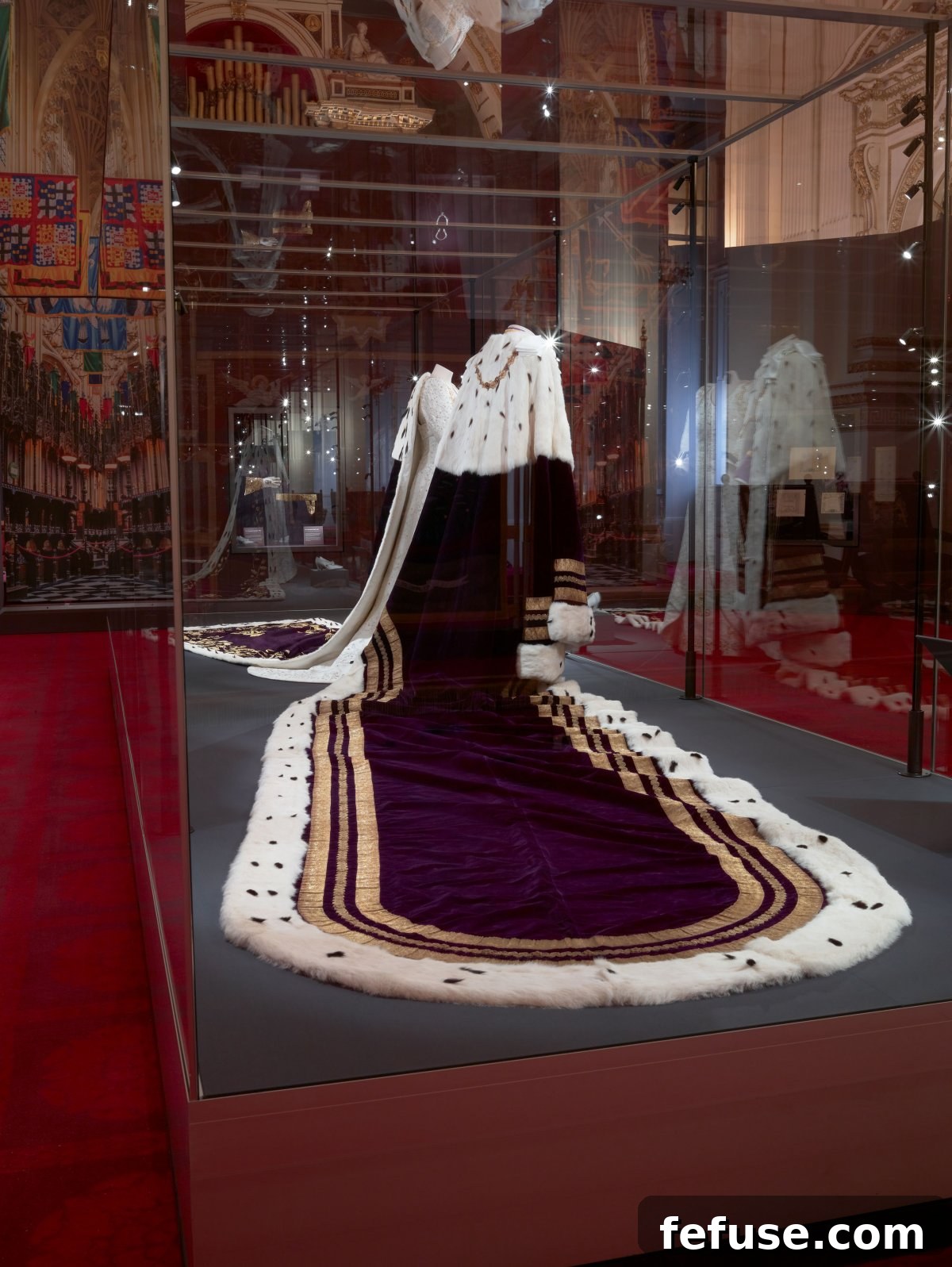King Charles III's Robe of Estate, worn during his departure from Westminster Abbey and previously by King George VI, showcased at the Buckingham Palace exhibition, July 2023. (Royal Collection Trust)