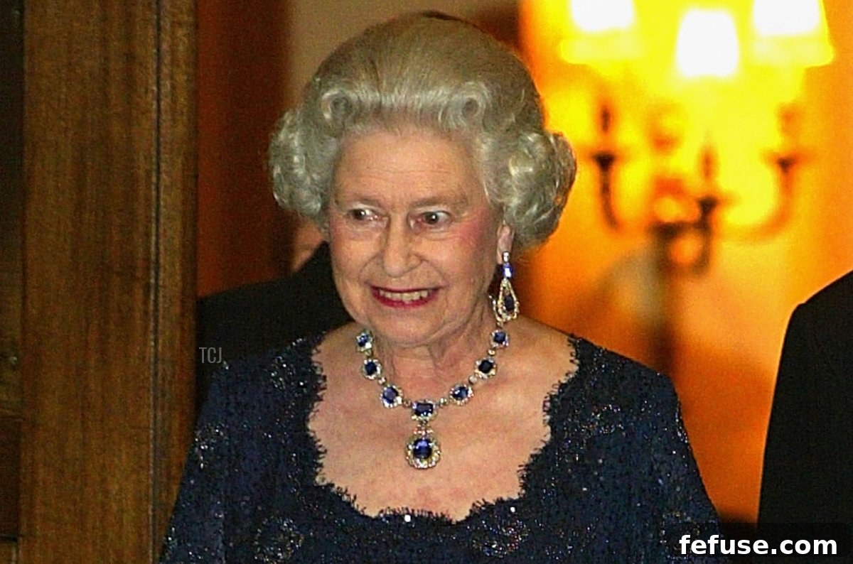 The Enduring Radiance of King George VI's Royal Sapphires 2 Queen Elizabeth II leaves the Ritz Hotel in London after a party celebrating her Golden Jubilee, November 14, 2002 (Scott Barbour/Getty Images)