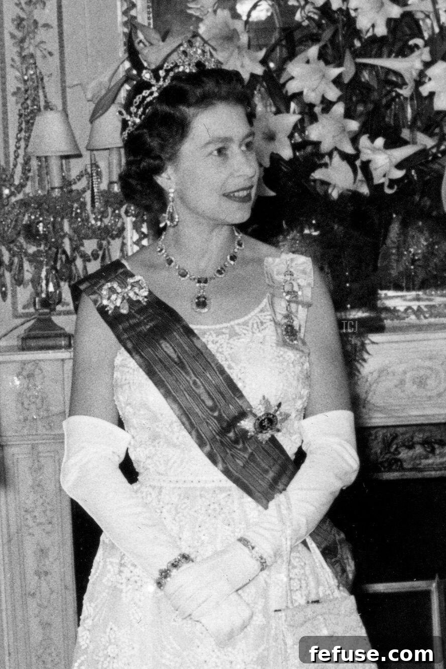 The Enduring Radiance of King George VI's Royal Sapphires 12 Queen Elizabeth II attends a dinner at the British Embassy in Brussels, May 1966 (Belga News Agency/Alamy)