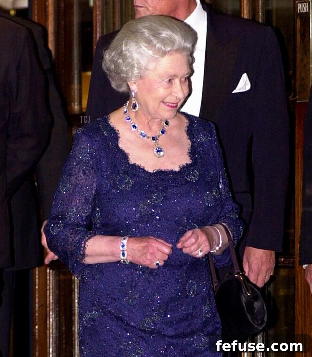 The Enduring Radiance of King George VI's Royal Sapphires 16 Queen Elizabeth II leaves the Ritz Hotel in London after a party celebrating her Golden Jubilee, November 14, 2002 (LOTTA JANSSON/AFP via Getty Images)
