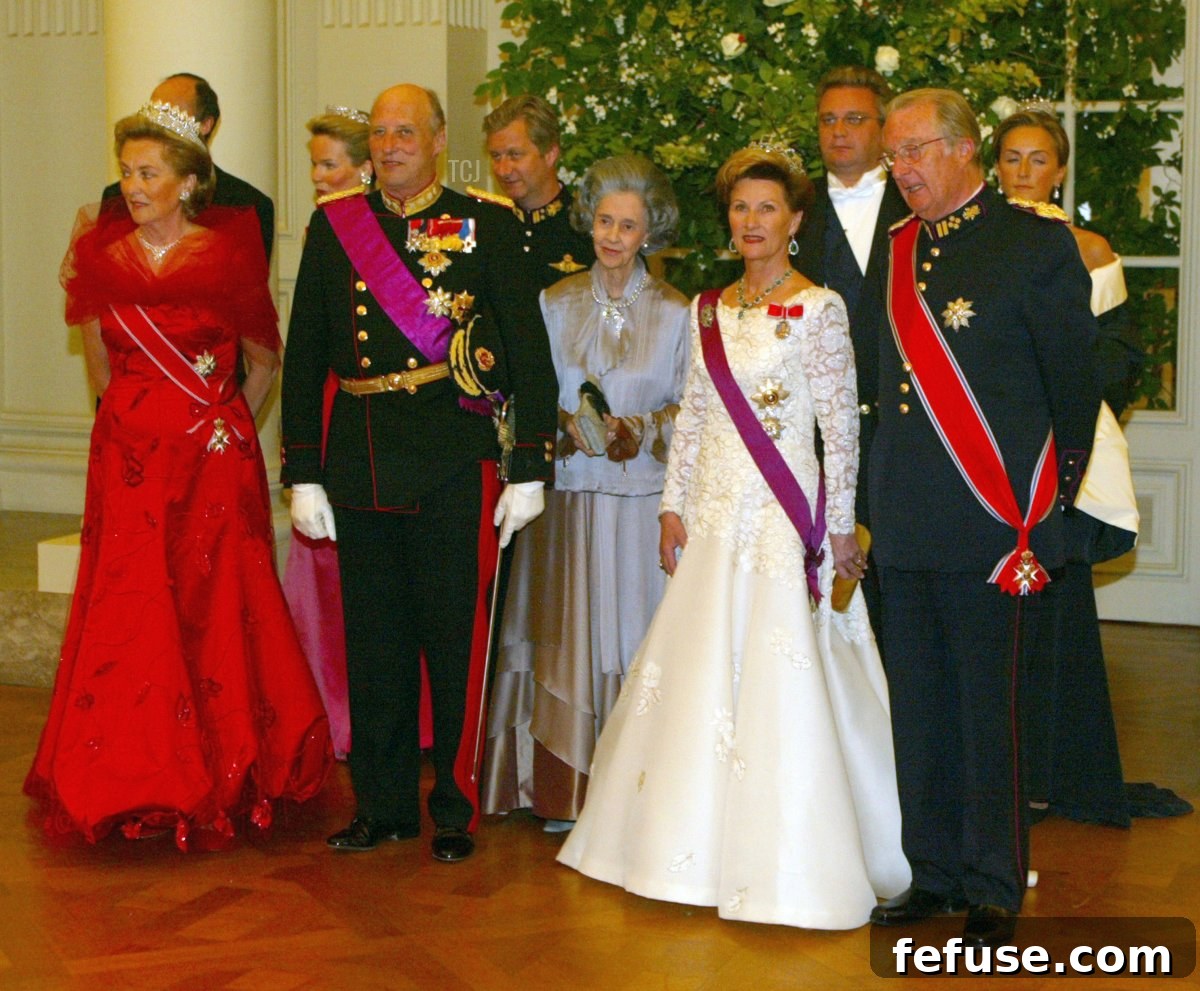 The Sentimental Sparkle of Queen Paola's Norwegian Tiara 4 Queen Paola, Prince Lorenz, Princess Mathilde, King Harald V of Norway, Prince Philippe, Queen Fabiola, Queen Sonja of Norway, Prince Laurent, King Albert II, and Princess Claire attend a state banquet in Brussels on May 20, 2003 (Mark Renders/Getty Images)