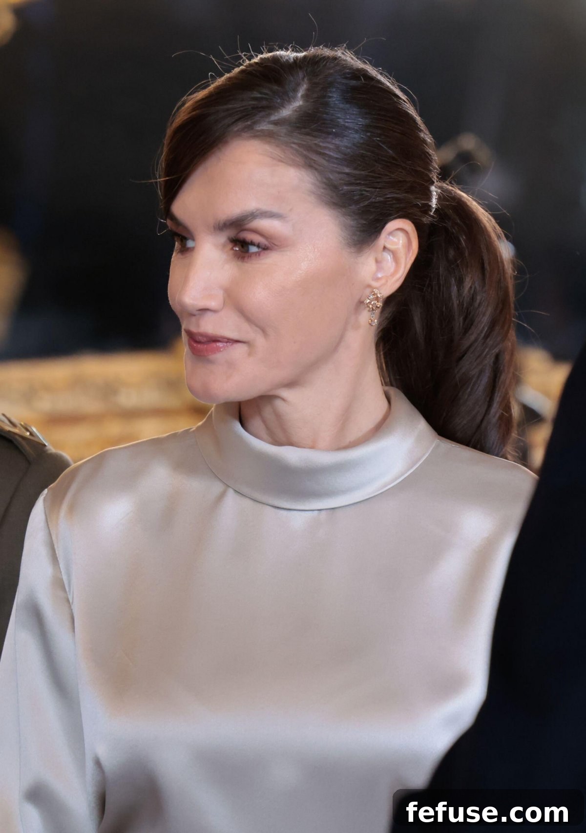 Queen Letizia of Spain wearing delicate gold earrings at the Pascua Militar reception, January 6, 2024