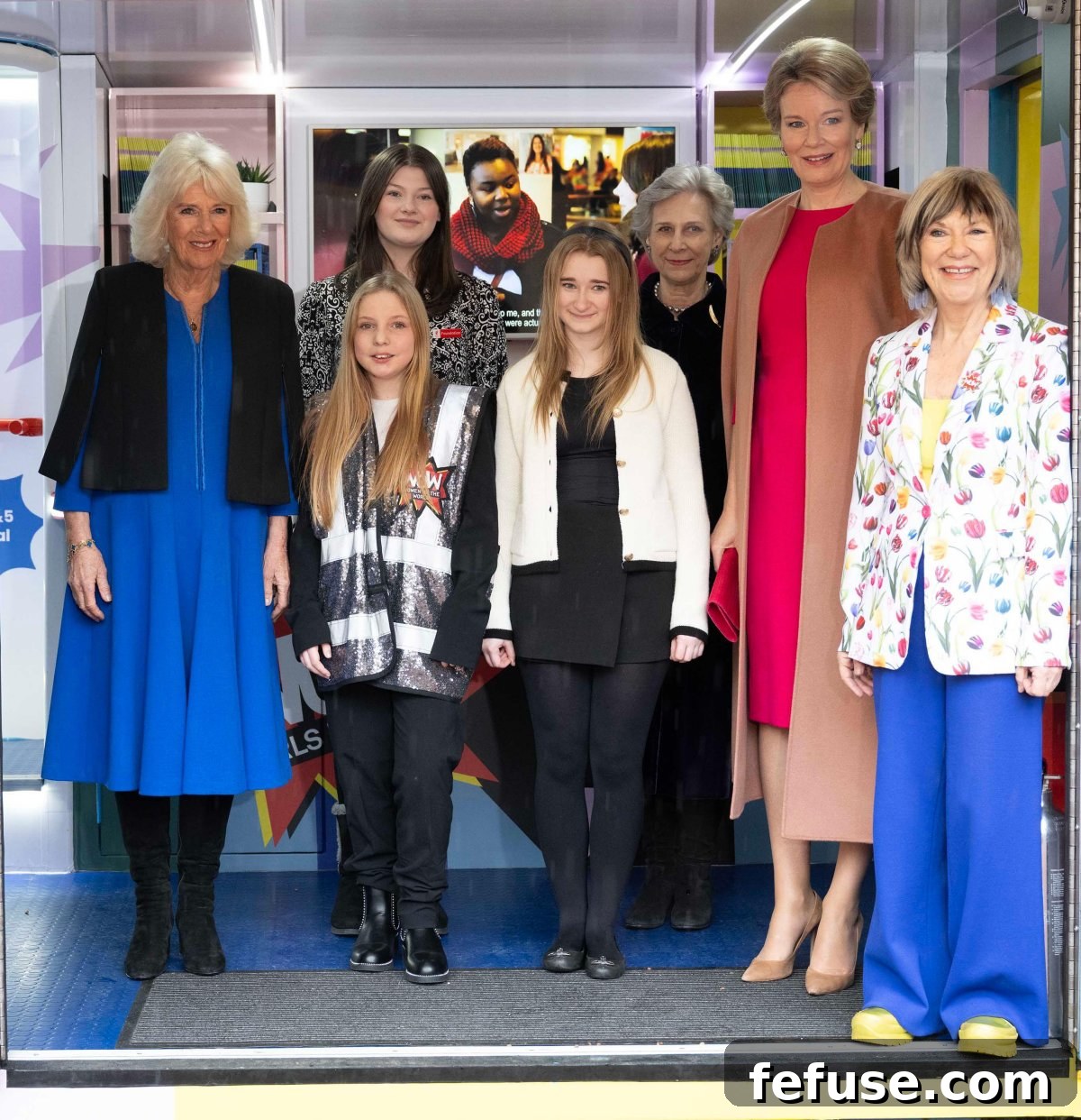 Queen Mathilde of the Belgians, the Duchess of Gloucester, and Queen Camilla greet guests at the WOW reception at Buckingham Palace