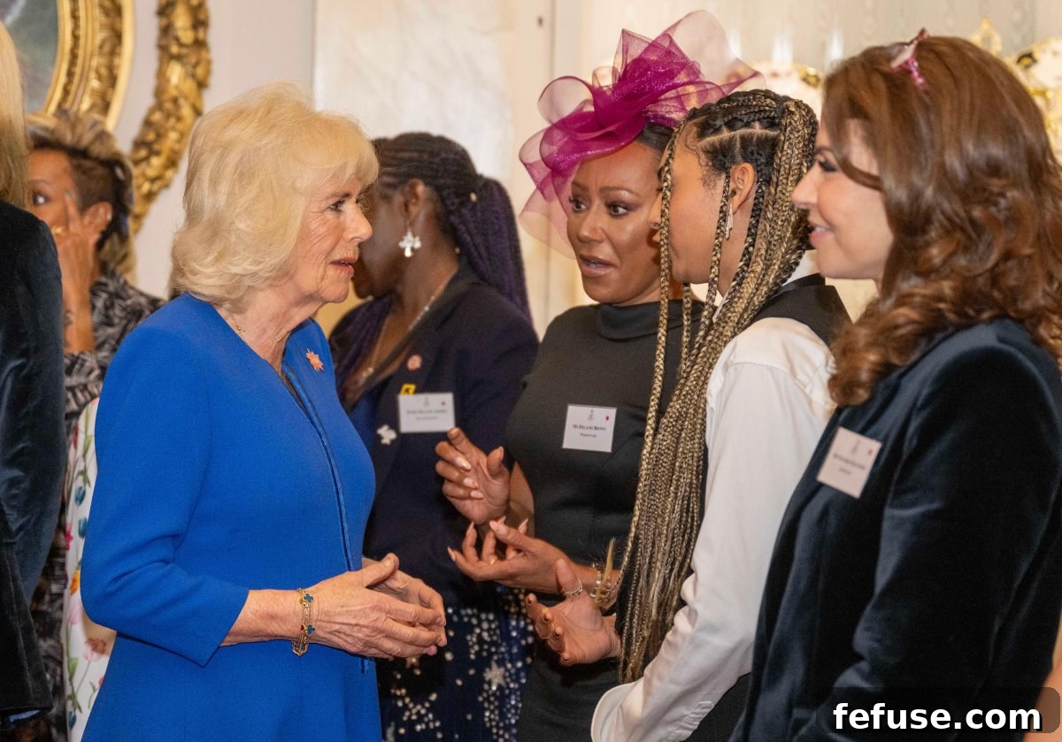 Queen Camilla in conversation with Melanie Brown (Mel B) and her daughter Phoenix at the Buckingham Palace WOW reception