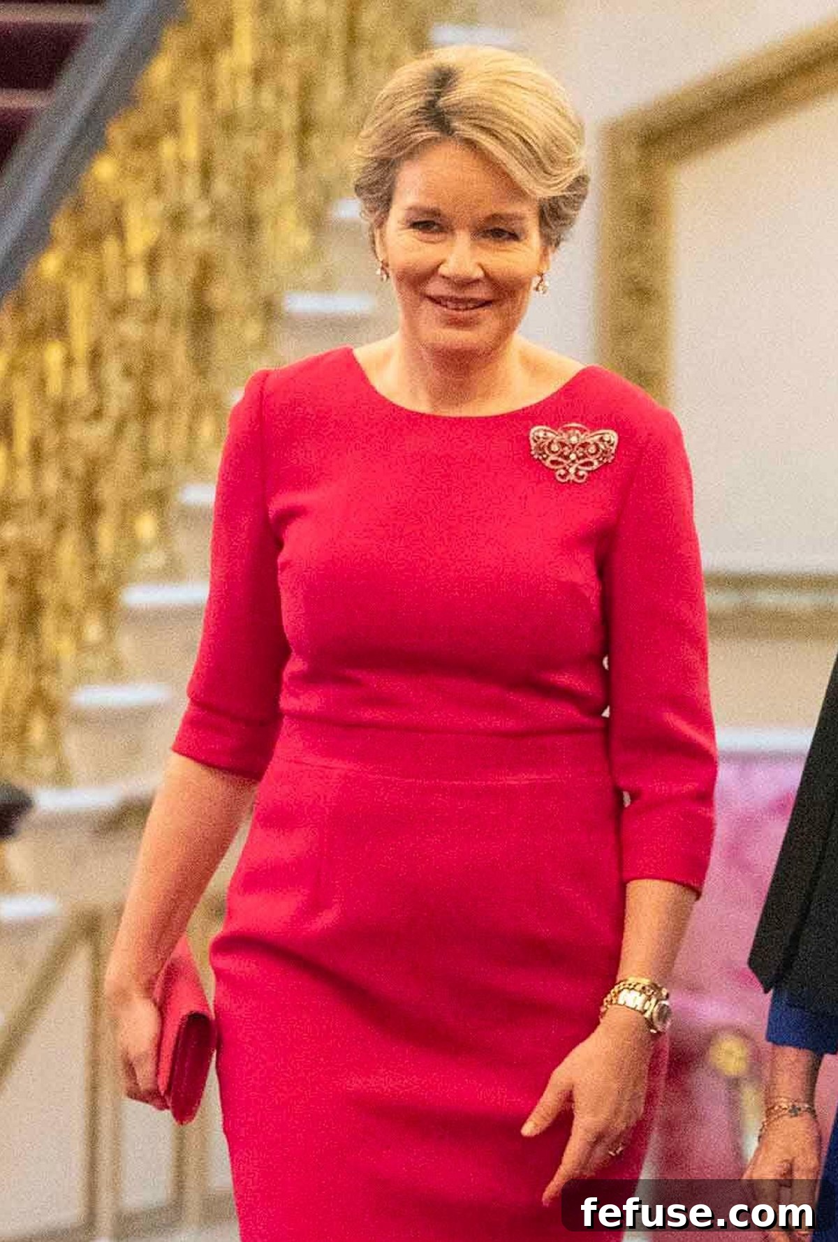 Queen Mathilde of the Belgians wearing diamond earrings and a prominent diamond brooch