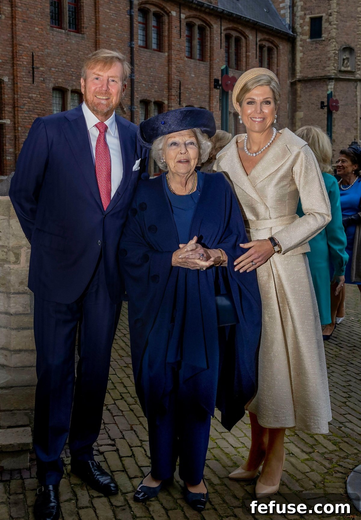 King Willem-Alexander, Queen Maxima, and Princess Beatrix engaging with guests at the Four Freedoms Awards Ceremony