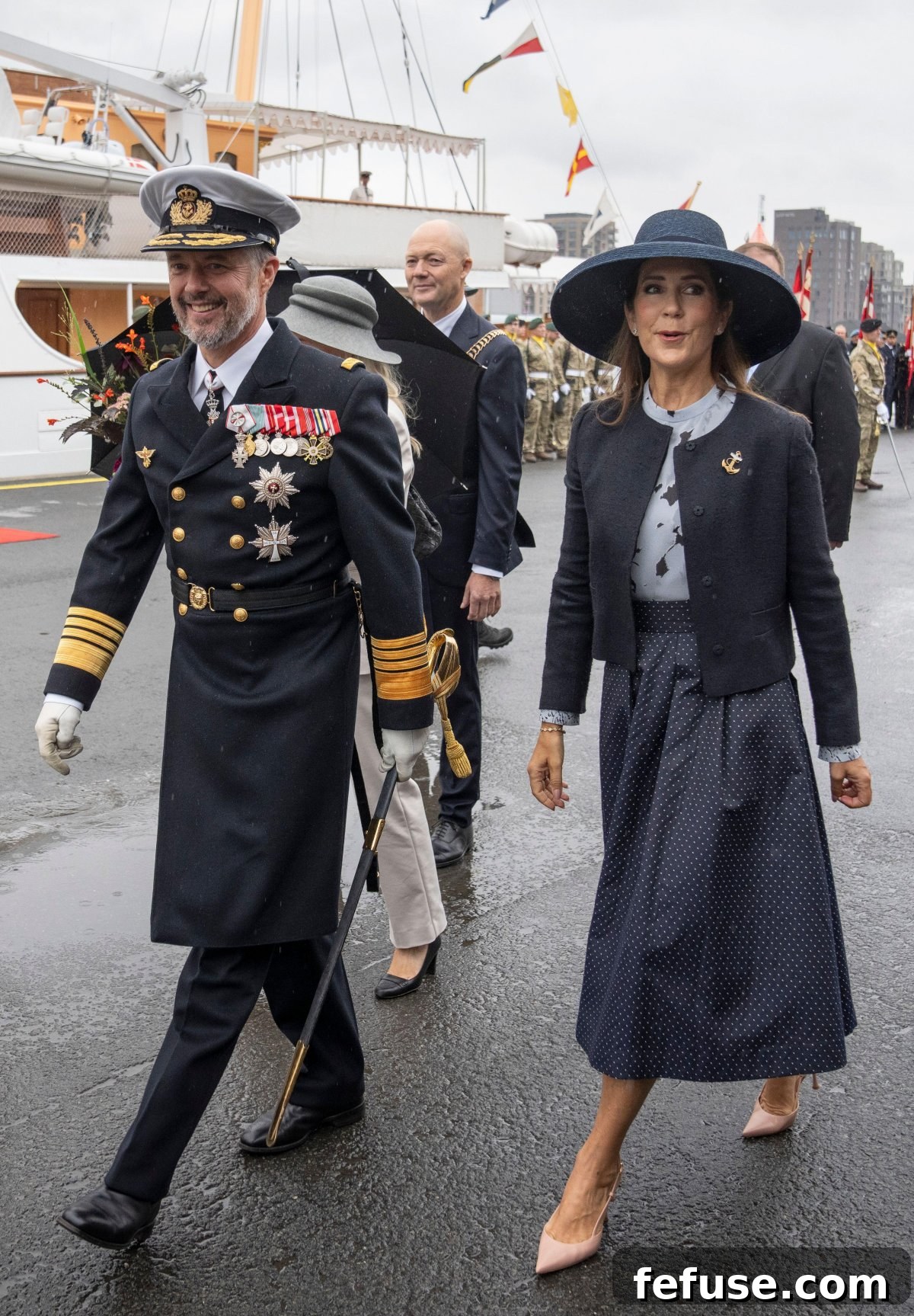 Queen Mary of Denmark and King Frederik X greet well-wishers in Velje during the royal summer tour.