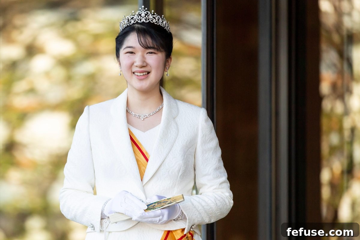 Princess Aiko of Japan greets members of the press ahead of her coming-of-age ceremony at the Imperial Palace in Tokyo on December 5, 2021 (Zuma Press/Alamy)