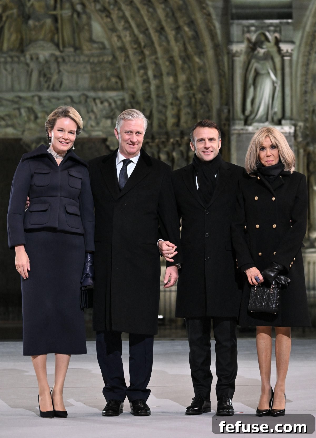 The King and Queen of the Belgians pose with President Emmanuel Macron and Brigitte Macron during the reopening ceremony for the Cathedral of Notre Dame in Paris on December 7, 2024 (Eliot Blondet/Abaca Press/Alamy)
