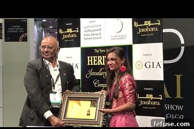 Shalini Chipped, an award-winning student from The IIS (Deemed to be University), presenting her unique heritage jewellery design 'Biyaban' at the international competition in Dubai.