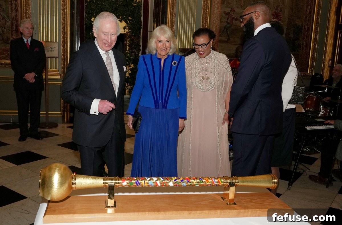 King Charles III and Queen Camilla attend a Commonwealth Day reception hosted by Baroness Scotland at Marlborough House in London on March 10, 2025 (Alistair Grant/PA Images/Alamy)
