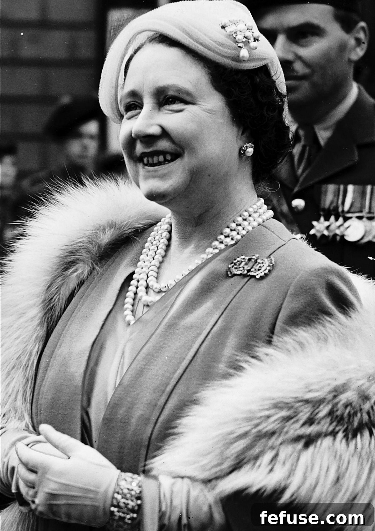 A Historic Sparkle: The Queen Mother's VE Day Cartier Brooch 8 Queen Elizabeth the Queen Mother visits Forfar, 1956 (Trinity Mirror/Mirrorpix/Alamy)