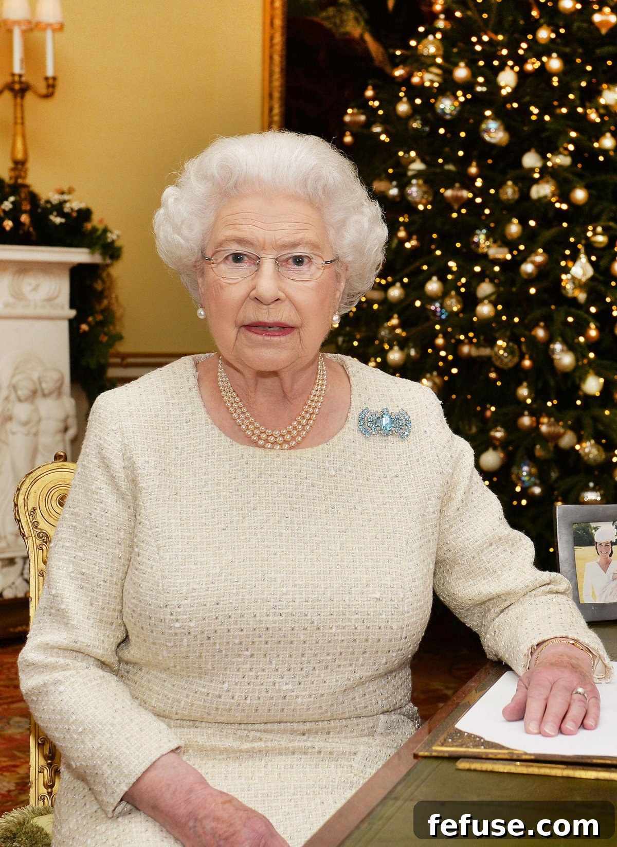 A Historic Sparkle: The Queen Mother's VE Day Cartier Brooch 10 Queen Elizabeth II records her annual Christmas Broadcast at Buckingham Palace, December 2015 (John Stillwell/PA Images/Alamy)