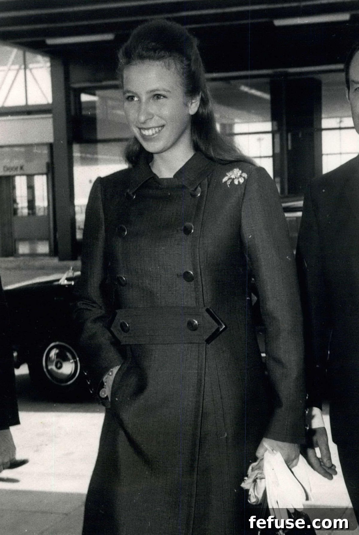 A young Princess Anne wearing her iconic floral brooch while traveling to Paris in June 1969