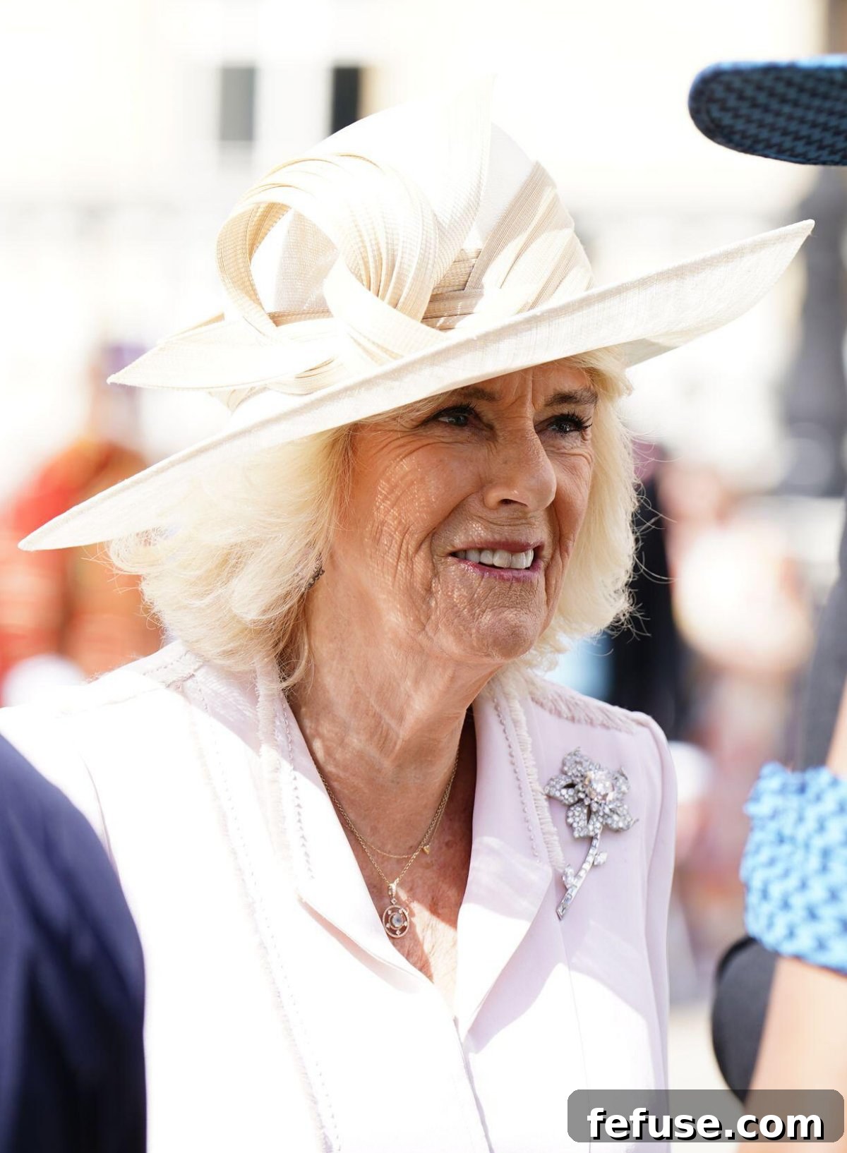 Queen Camilla of the United Kingdom attends a garden party at Buckingham Palace in London on May 15, 2024 (Aaron Chown/PA Images/Alamy)
