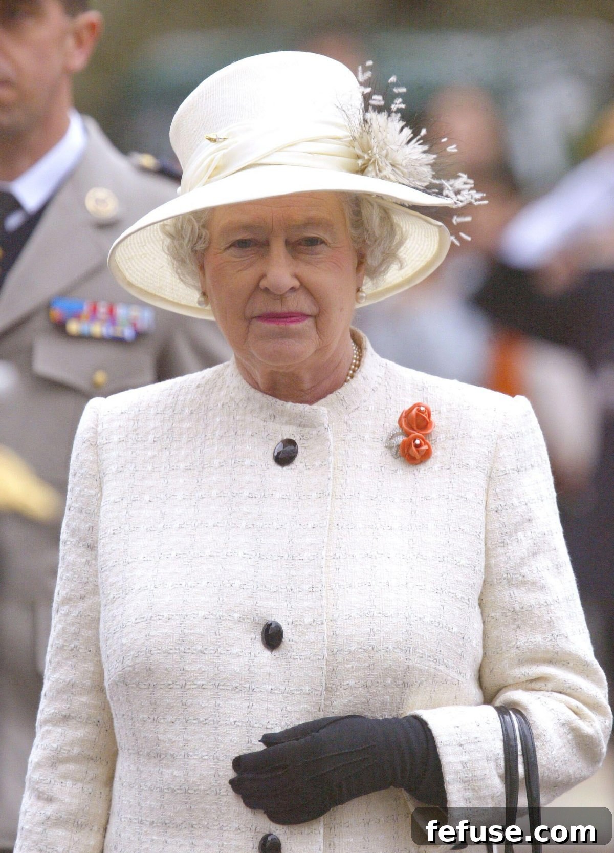 Queen Elizabeth II is pictured on the Champs-Elysees in Paris during a three-day state visit to France in April 2004 (Mousse-Hounsfield/Abaca Press/Alamy)