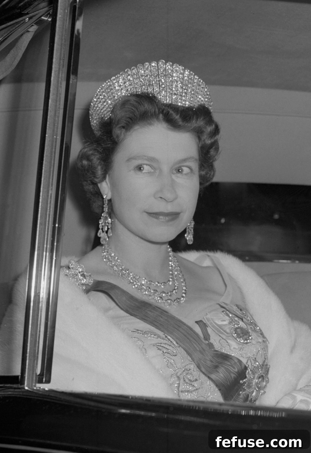Princess of Wales Illuminates in Queen's Diamond Chandeliers 7 Queen Elizabeth II leave the French ambassador's residence in London after a dinner hosted by President de Gaulle, April 1960 (PA Images/Alamy)