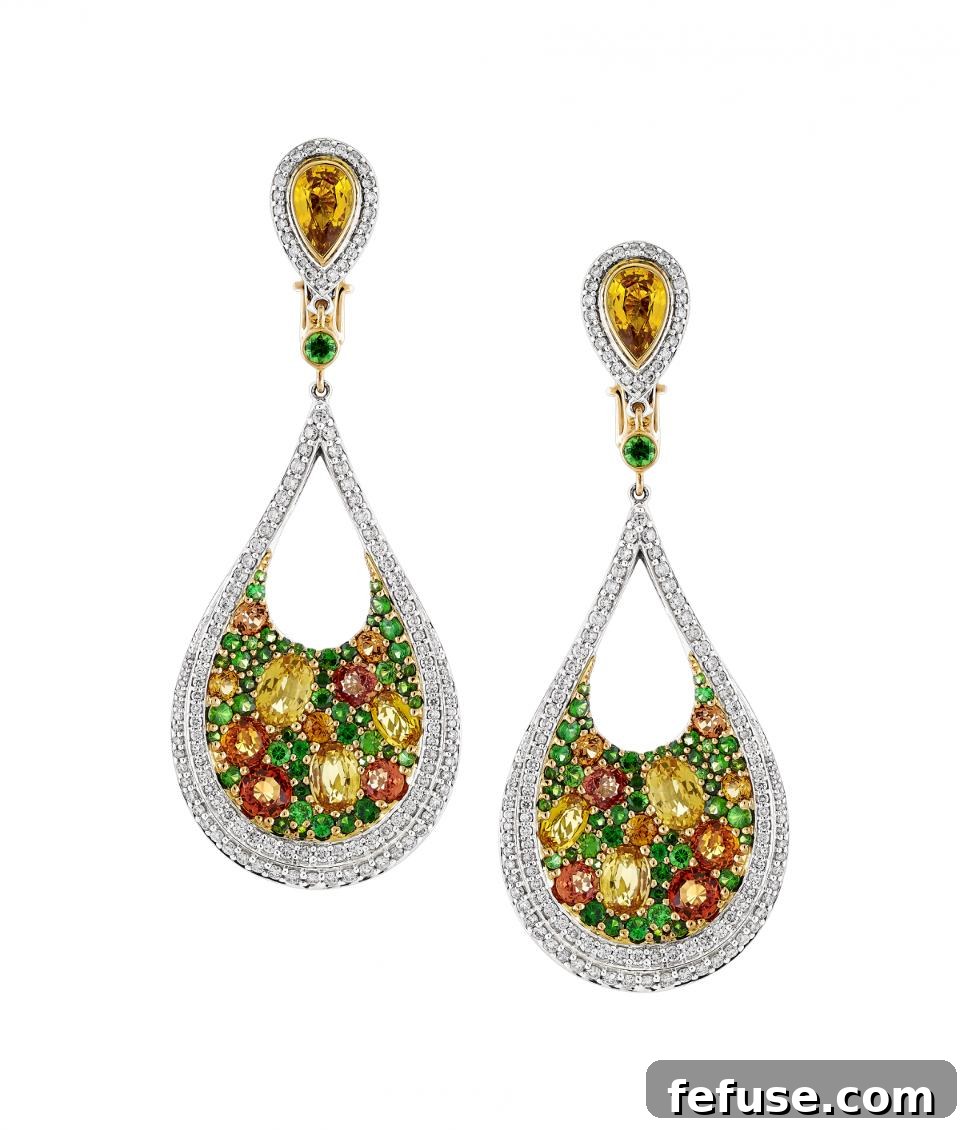 Zorab Creation 18k gold and palladium earrings with orange sapphires, yellow and white diamonds, and tsavorite