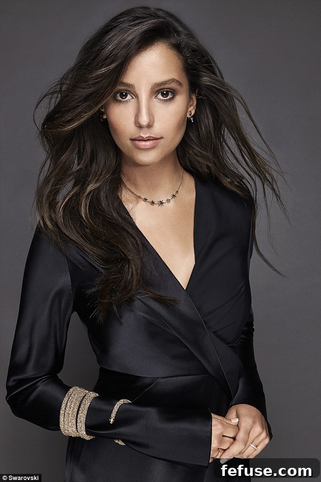 Vitoria Triboni exudes sultriness in a plunging silk wrap dress, accessorized with elegant Swarovski jewellery for the Crystaldust campaign