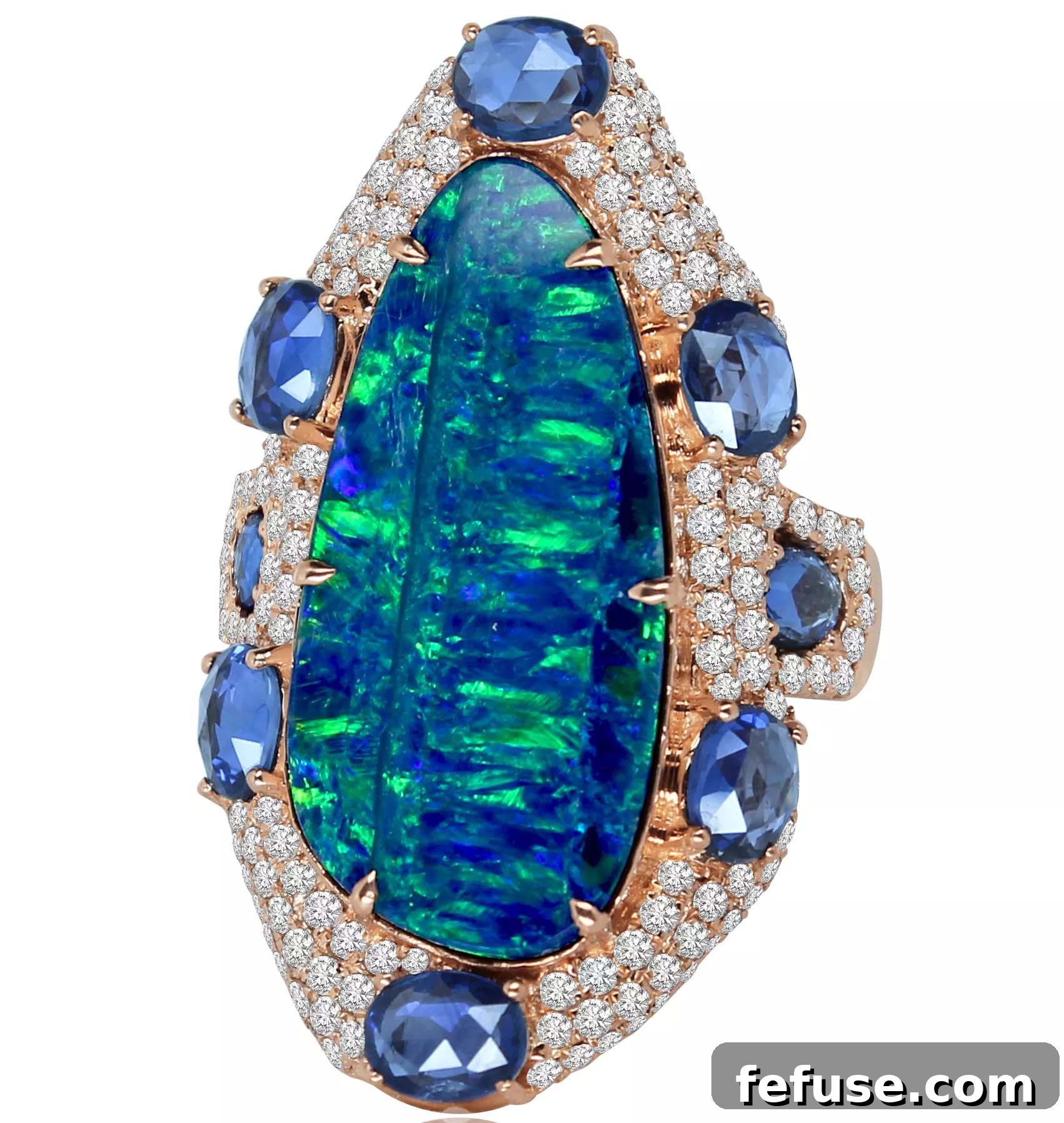 Ring with 8 carat Australian opal, sapphires, and diamonds in 18k rose gold by Sutra