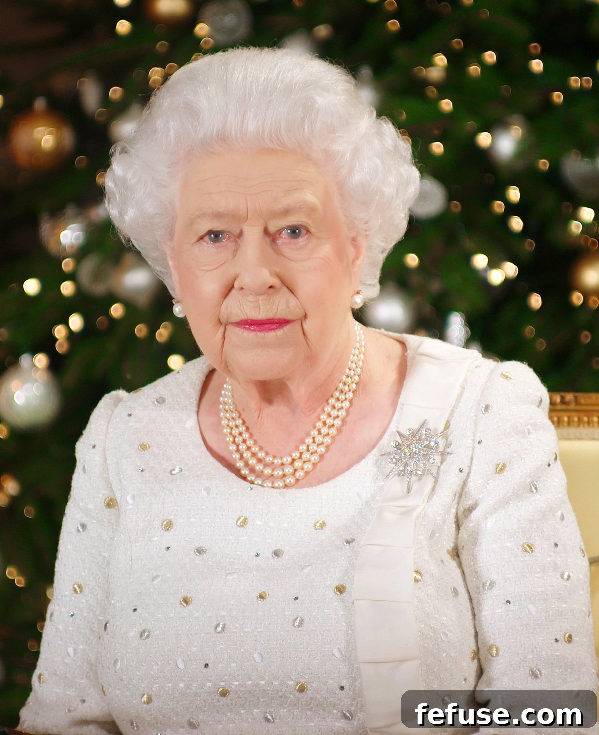 Queen Elizabeth II recording her Christmas Day broadcast in the 1844 Room at Buckingham Palace, 2017, wearing the Jardine Star Brooch.